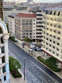 High angle view of street amidst buildings in city