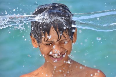 Close-up of a boy in water