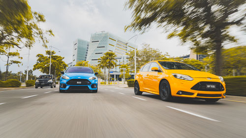 Cars on road in city