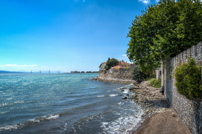 View of sea against blue sky