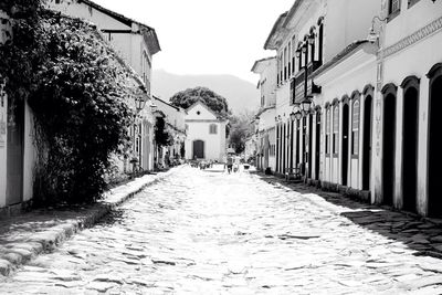 Narrow alley along buildings