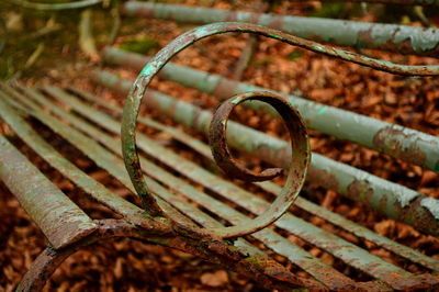 Close-up rusty metal bench