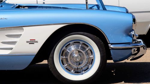 Close-up of vintage car on street