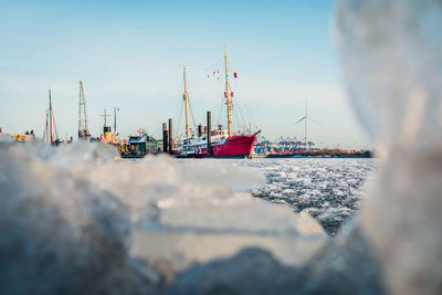 Frosty winter day in hambur,  harbour, ships elb river, frozen in hamburg germany
