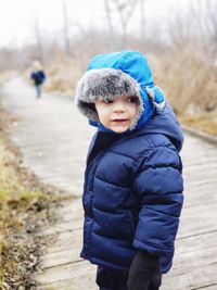 Full length of a boy in snow