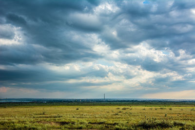 Cloudy summer day in green and yellow steppe