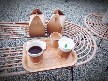 High angle view of coffee cups on table