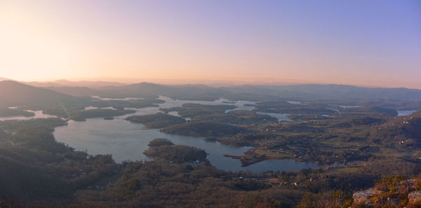 Aerial view of landscape against sky during sunset