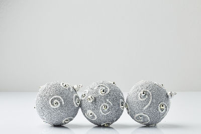 Close-up of candies against white background