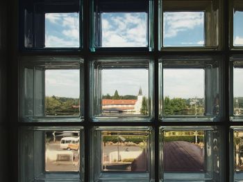 View of cityscape through window