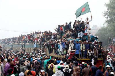 Large number of people are travelling in train. 