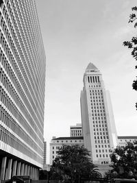 Low angle view of skyscrapers against sky