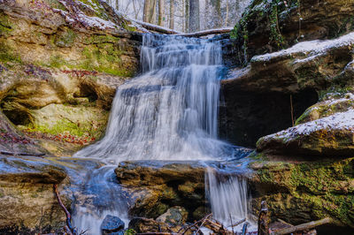 Scenic view of waterfall in forest