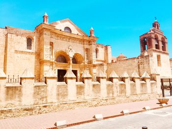 Exterior of old building against clear blue sky