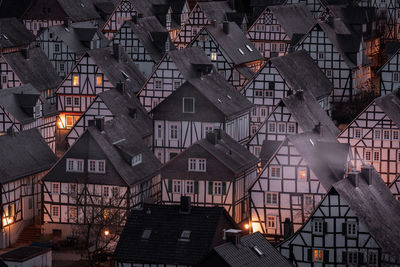 Low angle view of illuminated buildings in town