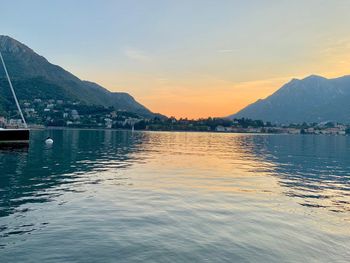 Scenic view of lake against sky during sunset