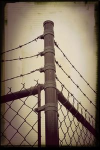 Fence seen through chainlink fence