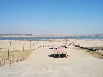 Scenic view of beach against clear sky