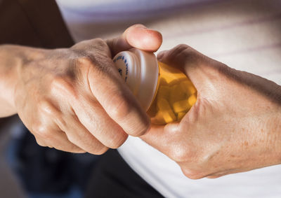 Close-up of person holding hands