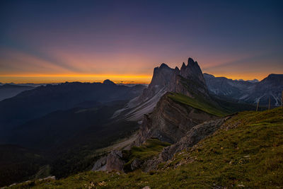 Seceda, dolomites - panoramic view of mountains during sunrise