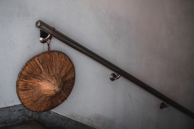 High angle view of electric lamp on table against wall