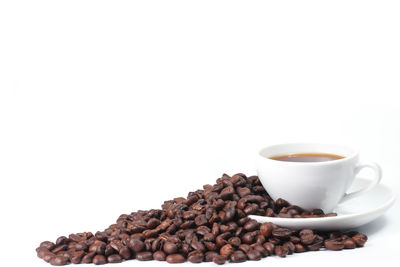 Close-up of coffee cup against white background