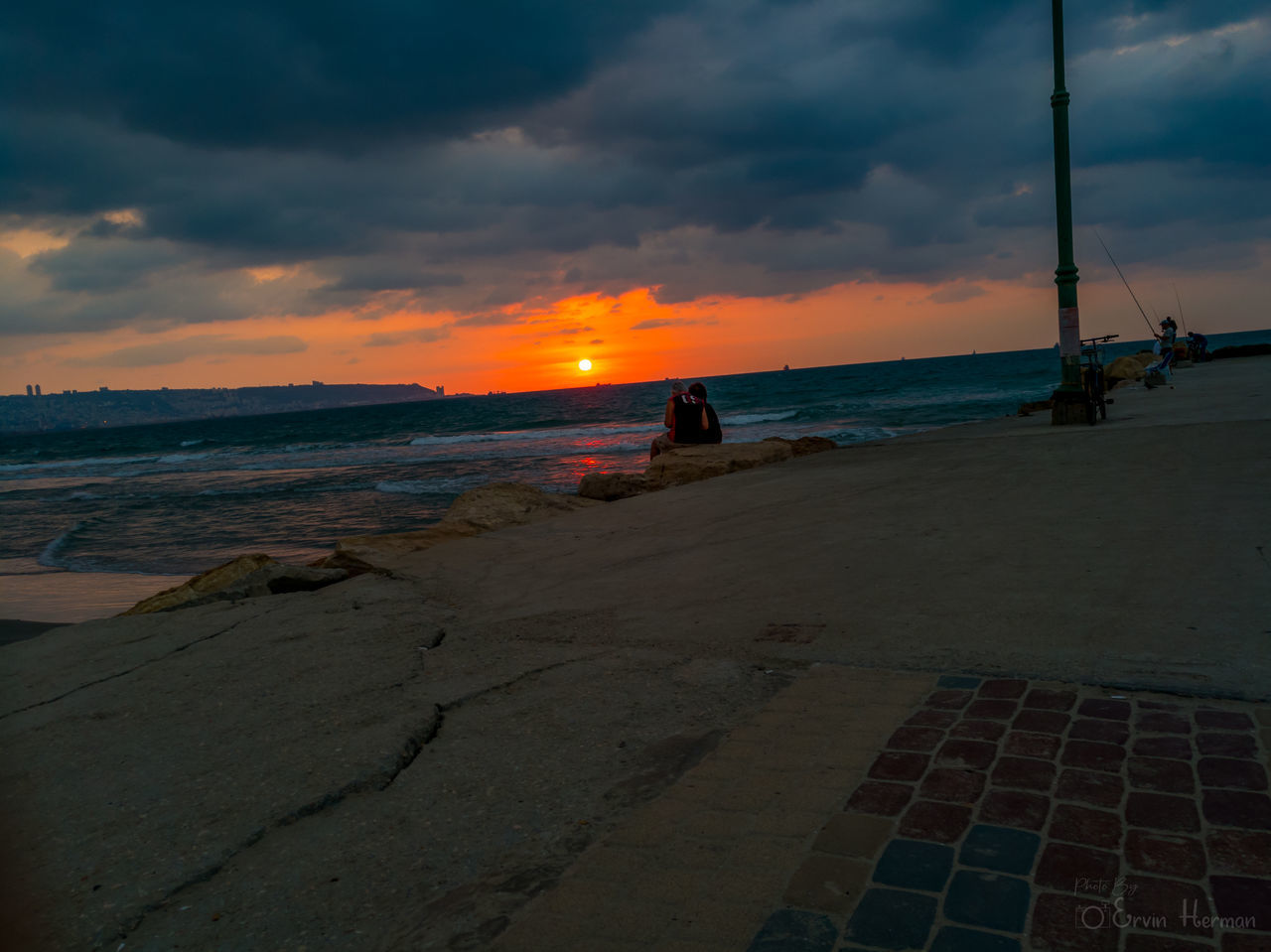 SCENIC VIEW OF BEACH DURING SUNSET