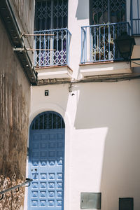 Low angle view of building against blue sky