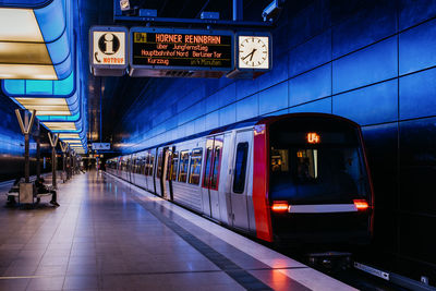 Train at railroad station at night