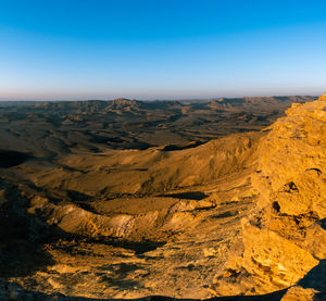 Scenic view of desert against sky