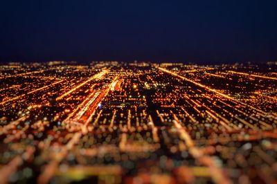 View of illuminated city at night