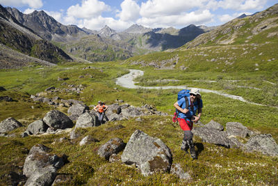 Couple hikes up wintergreen creek, talkeetna mountains, alaska