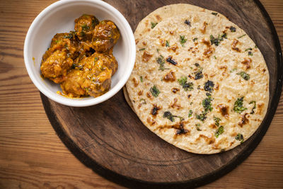 High angle view of pizza in bowl on table