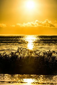 Scenic view of sea at sunset