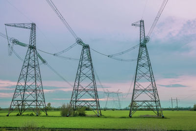 Group silhouette of transmission towers, power tower, electricity pylon, steel lattice tower 