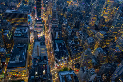 High angle view of illuminated city at night