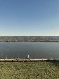 Scenic view of lake against clear sky