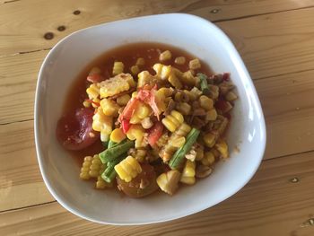 High angle view of salad in bowl on table