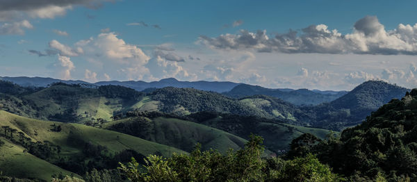 Panoramic view of landscape and mountains against sky