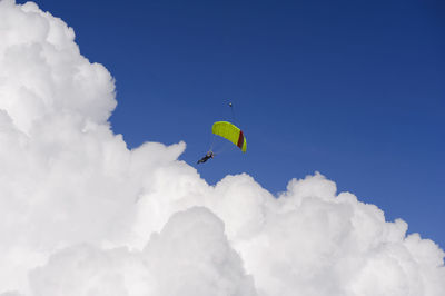 Low angle view of kite flying in sky