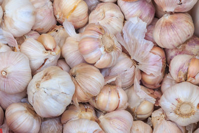 Full frame shot of onions for sale at market