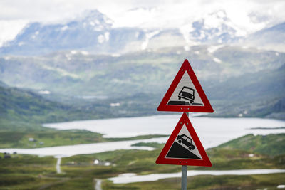 Warning road signs in mountains