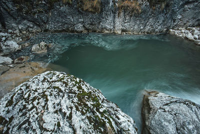 High angle view of rock formation in sea