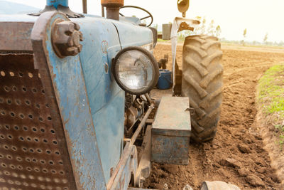 Close-up of tractor on field
