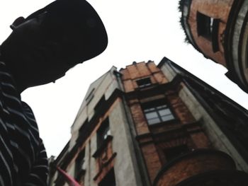 Low angle view of buildings against clear sky