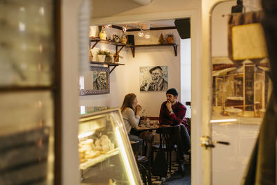 Couple sitting in cafe