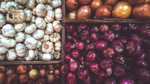 Full frame shot of onions for sale at market stall