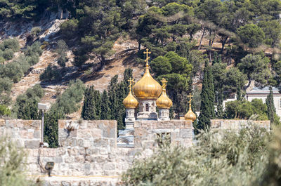 View of temple against building