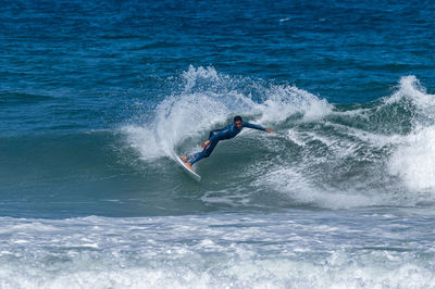 Man surfing in sea