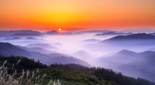 Scenic view of mountains during sunset